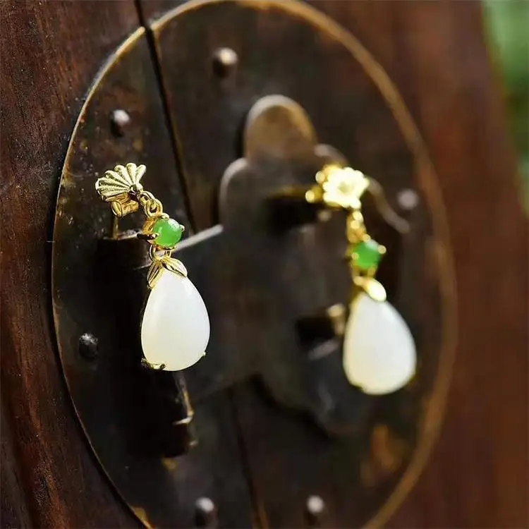 

Silver inlaid natural Hotan white jade pith drop shaped long earrings Chinese style retro Bohemian charm women's jewelry