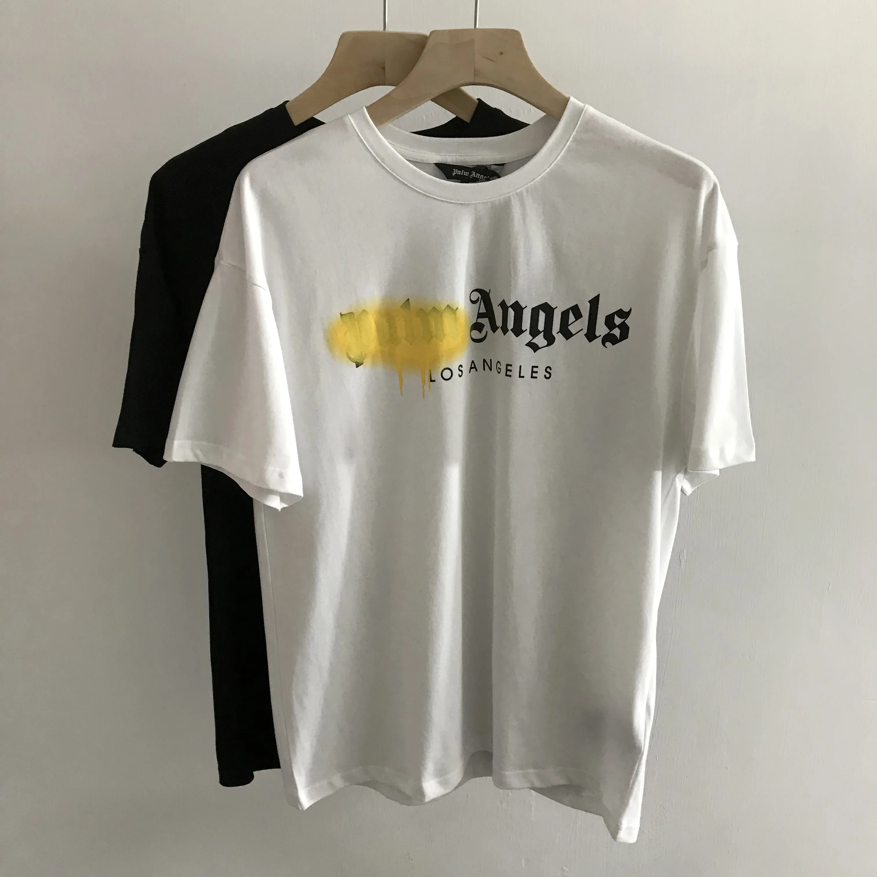 

Palm Angels spray letters short-sleeved spring summer men women with the same casual all-match loose T-shirt 15648966