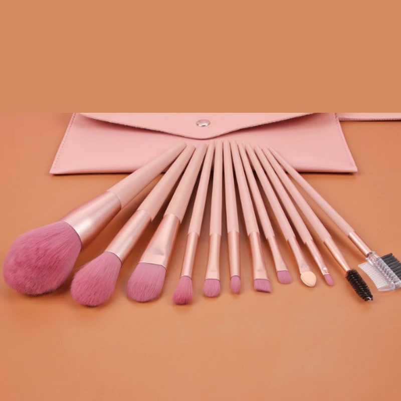 Набор розовых кистей для макияжа нанесения основы пудры румян теней бровей