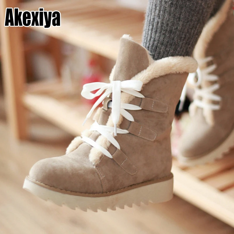 

Новые зимние товары, женские удобные замшевые повседневные модные зимние сапоги на шнуровке, на танкетке, теплые классические женские сапо...