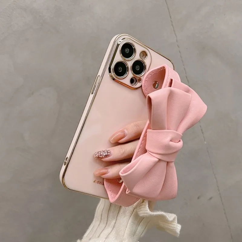 Korea 3D Leather Bow Wrist band Holder Plating Phone Case For iphone 14 13 12 11 Pro Max MiNi X XS Max XR 6 S 7 8 Plus SE Cover images - 6