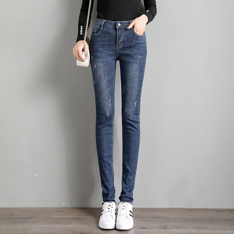 Женские джинсы на весну и осень облегающие со средней посадкой Эластичные