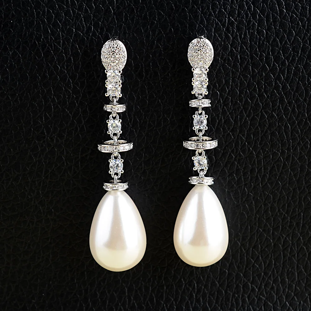 Teardrop White Sea Shell Pearl Golden Plated Earrings | Dangle
