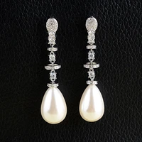 teardrop white sea shell pearl white golden plated earrings
