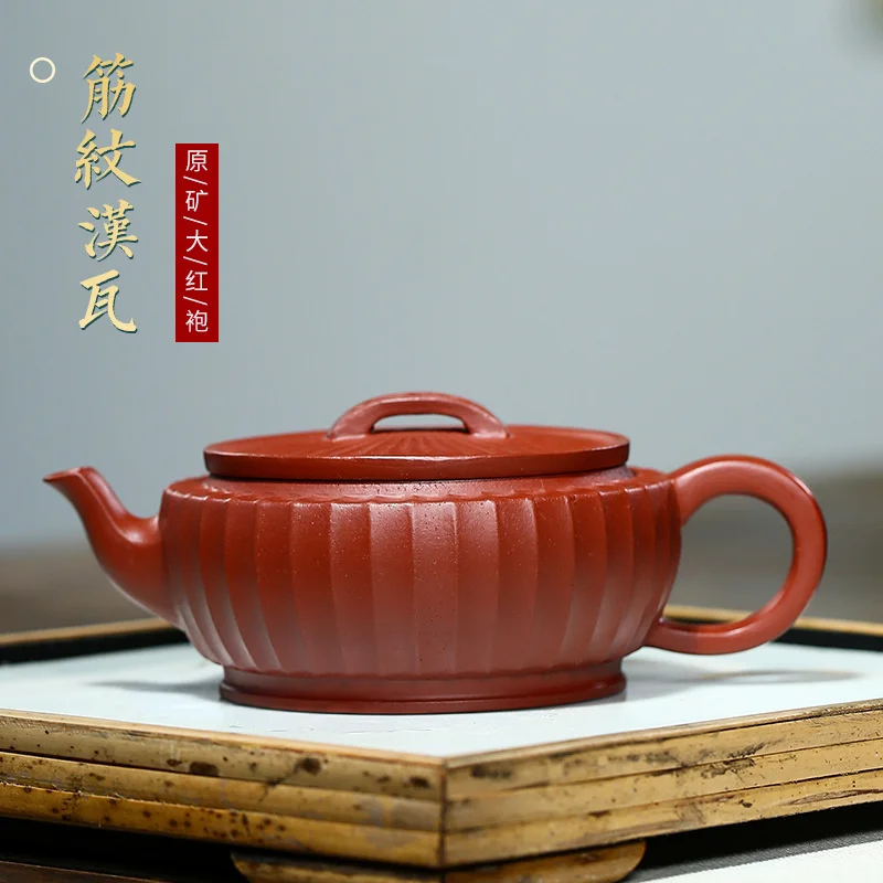 

Mixed batch of handmade brocade pattern Hanwa teapots and tea sets in Yixing zishahu raw ore