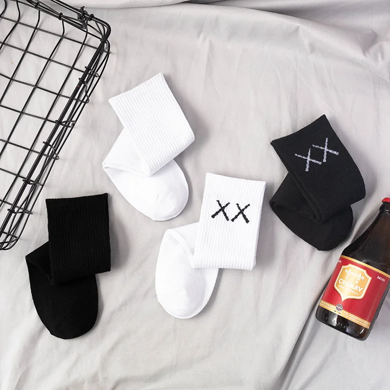 Autumn and winter white socks men's medium tube solid color socks ins couple fashion socks XX Xiha Street long tube fashion