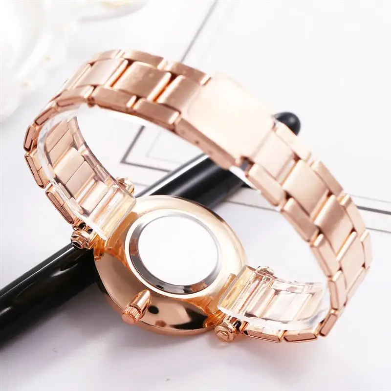 Модные вращающиеся алмазные часы женские из нержавеющей стали кварцевые на