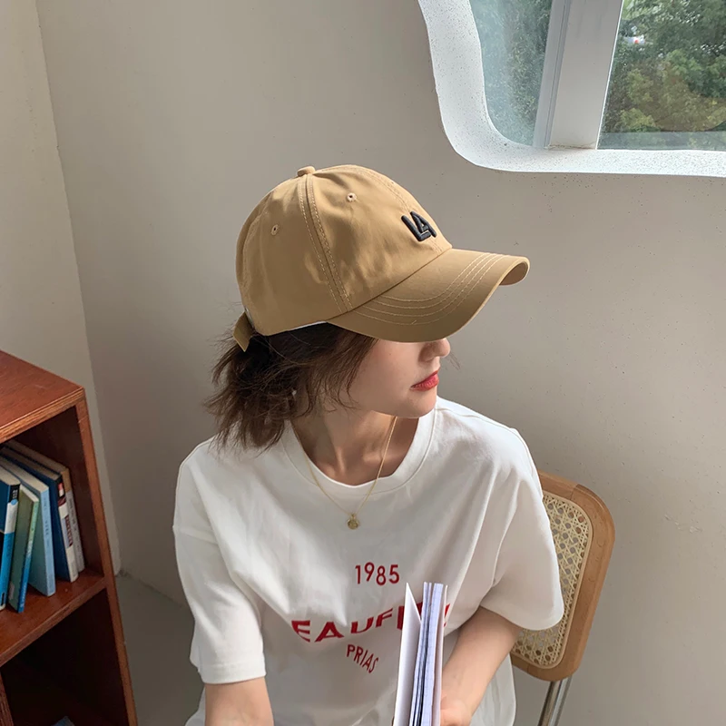 

Hat girl spring and summer versatile small letter baseball cap Korean version soft top leisure sunshade cap cute hat