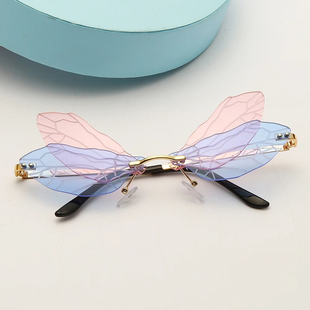 

New Fashion Rimless Sunglasses Brand Design Women Vintage Metal Butterfly Sun glasses Luxury Glasses UV400 Shades Eyewear Oculos