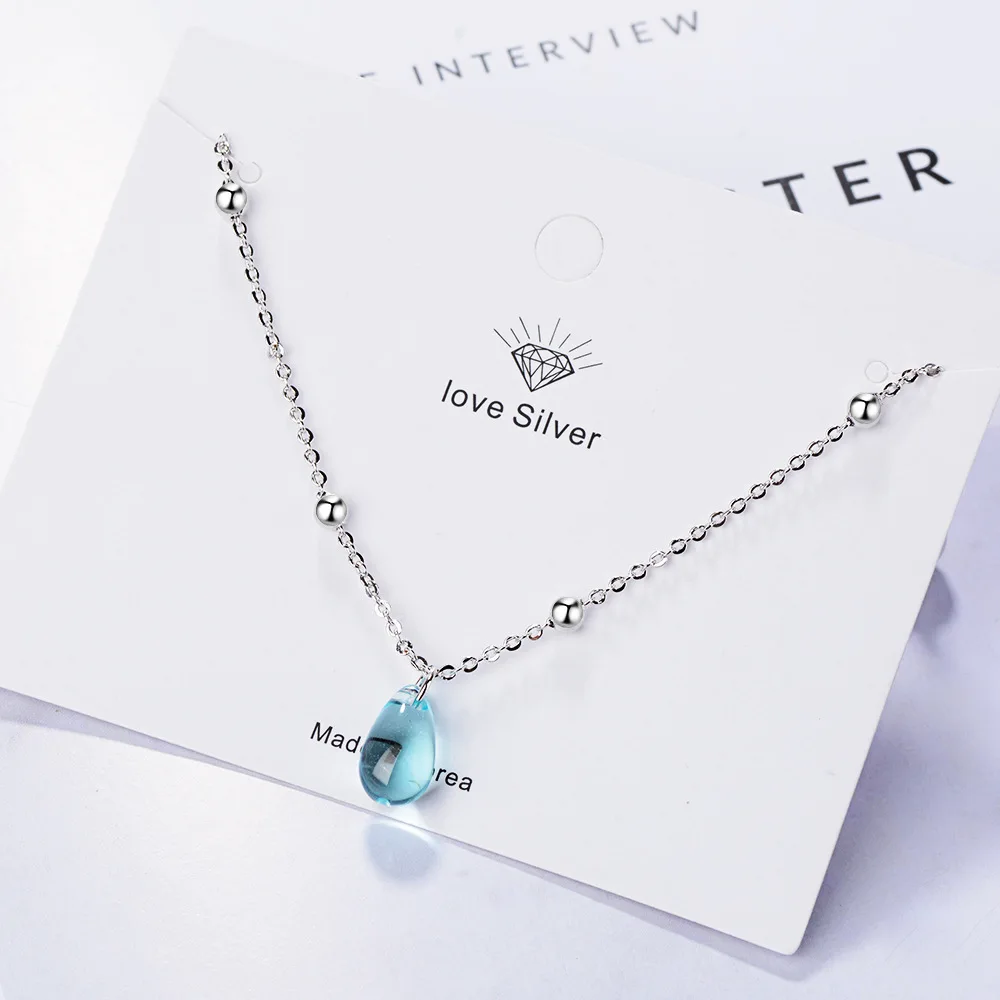 Женский браслет из серебра 925 пробы с голубыми кристаллами в форме капли