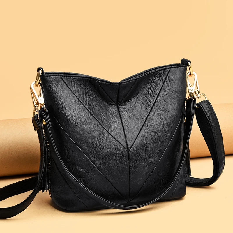 

Luxury designer handbags 2020 winter new high-quality leather shoulder bag trendy tassel messenger bag brand bucket bag hot sale