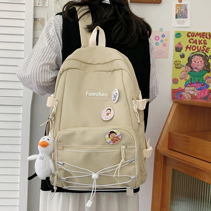 

EST 2021 Fashion Backpack Girls Schoolbag Waterproof Nylon Kawaii Badge Large Capacity Cute Shoulders bag Mochilas Strings bags