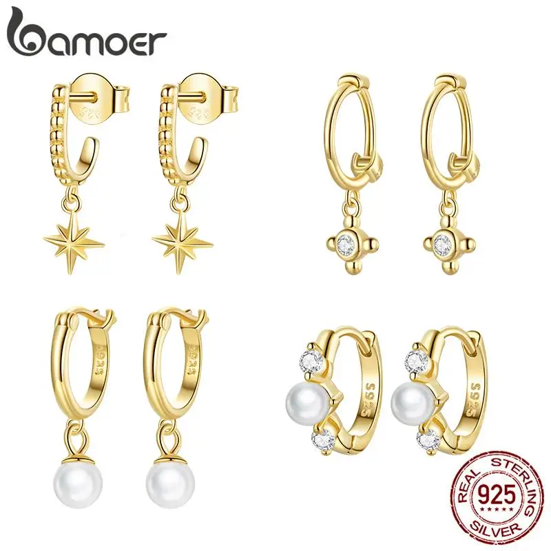 

Серебряные серьги-кольца с цирконами