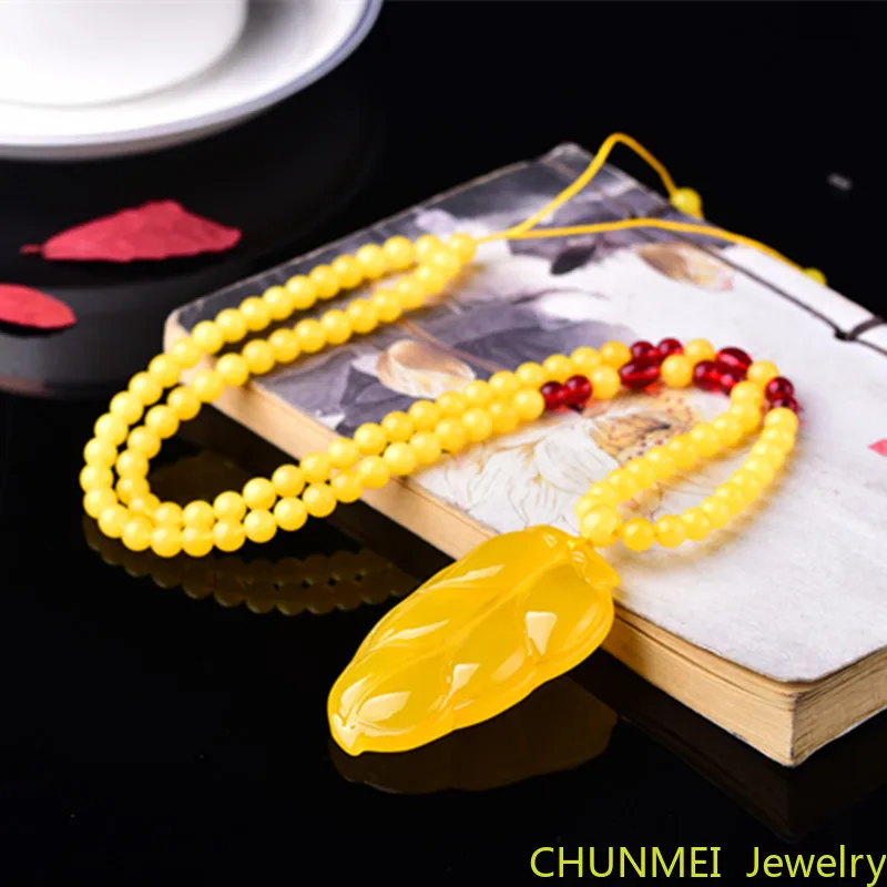 

Янтарь из воска кулон с маленькими листьями куриное масло желтый старый мед резной кулон Женская Длинная цепочка на свитер ожерелье с золот...