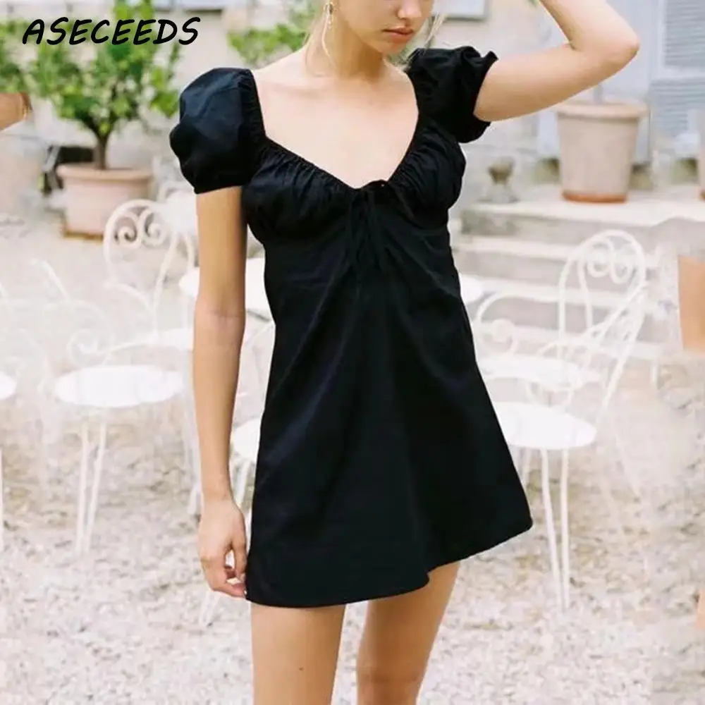 Женское винтажное мини платье в стиле бохо элегантное пикантное с бантом и