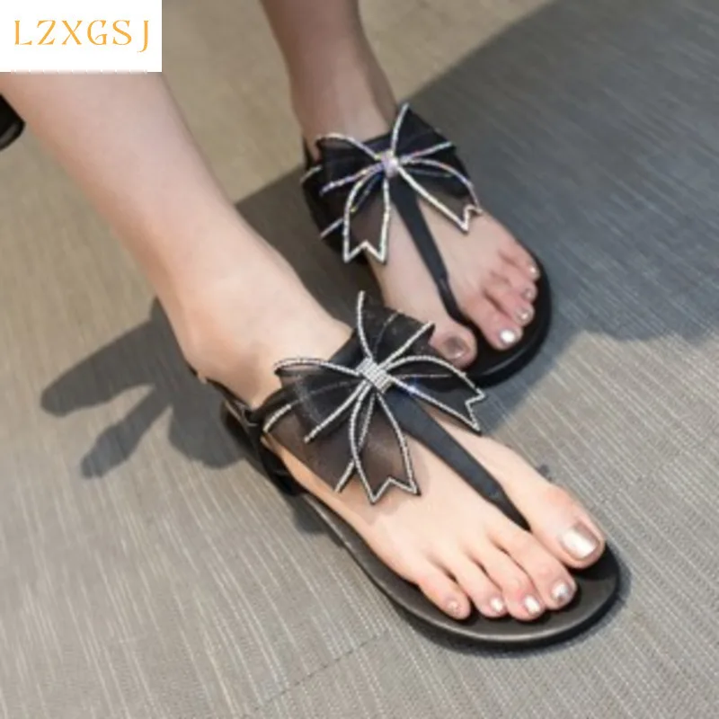 

Summer Thong Sandals 2021 New Leather Flat Shoes Versatile One Word Belt Bowknot Flip Flops Lady Female Fashion Roman Shoes