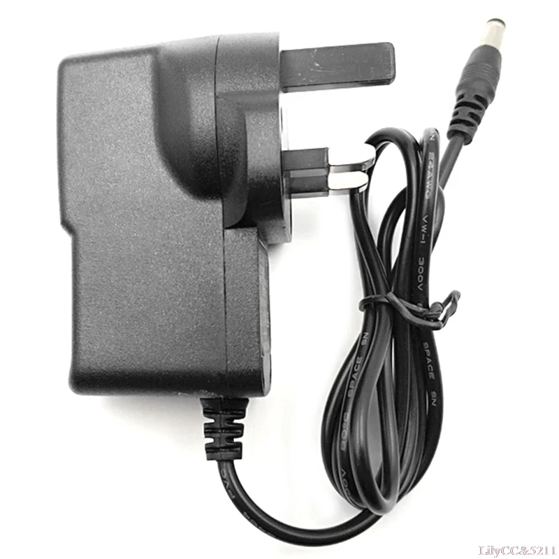 Зарядное устройство 12 В 1 А вилка стандарта Великобритании универсальная