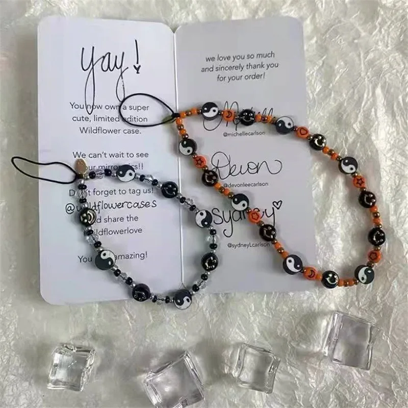 

Special Yin Yang Tai Chi Transparent Color Orange Black Round Beads Smiley Face Phone Chain Women's Lanyard Jewelry Accessories