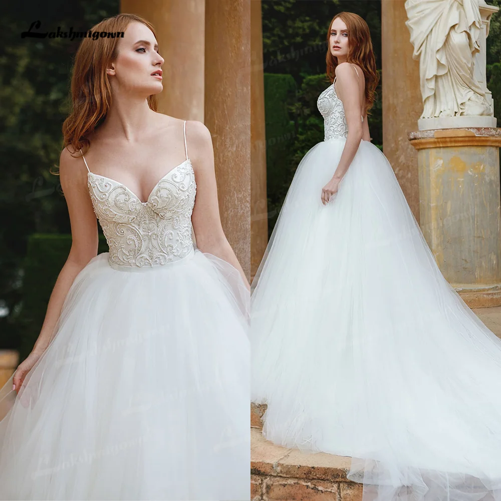 

Sexy Bohemian Wedding Dresses 2022 Chic Lace Beach Boho Simple Spaghetti Straps Unique Beading Wedding Bridal Gown Robe Mariee