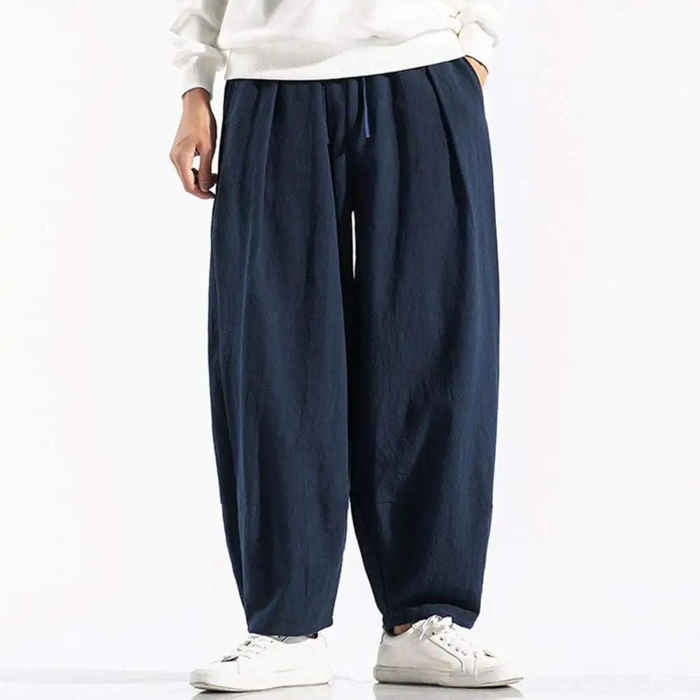 

Fashion Oversize Men Harem Pants Solid Color Drawstring Loose Men Mid Rise Pockets Casual Pants pantalones hombre штаны мужские