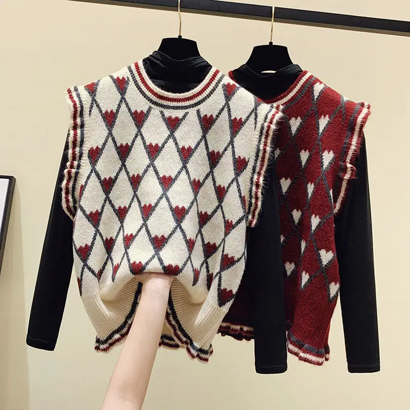 

Жилет женский осенне-зимний, без рукавов, с оборками