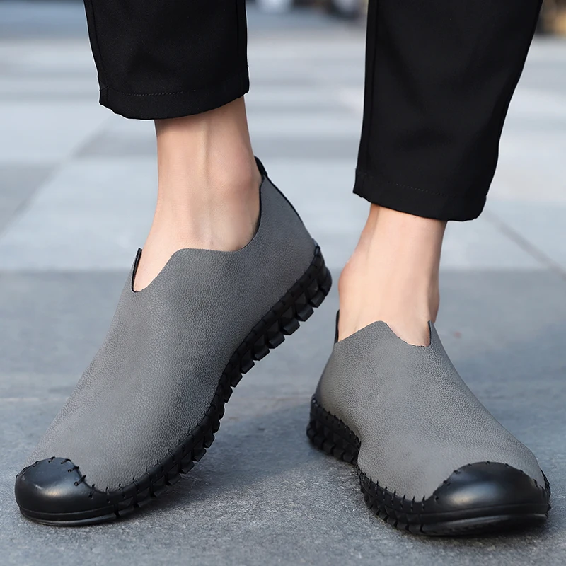 

Black Sewing Leather Loafers Men Shoes Slip On Hollow Out Breathable Male Mocassin Big Size 38 To 48 Gray Flat Mocasini Man