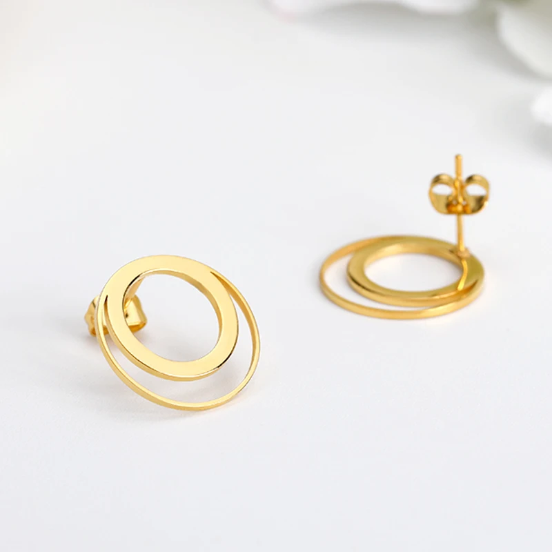 Серьги гвоздики с двойным кольцом высокого качества золотого цвета из