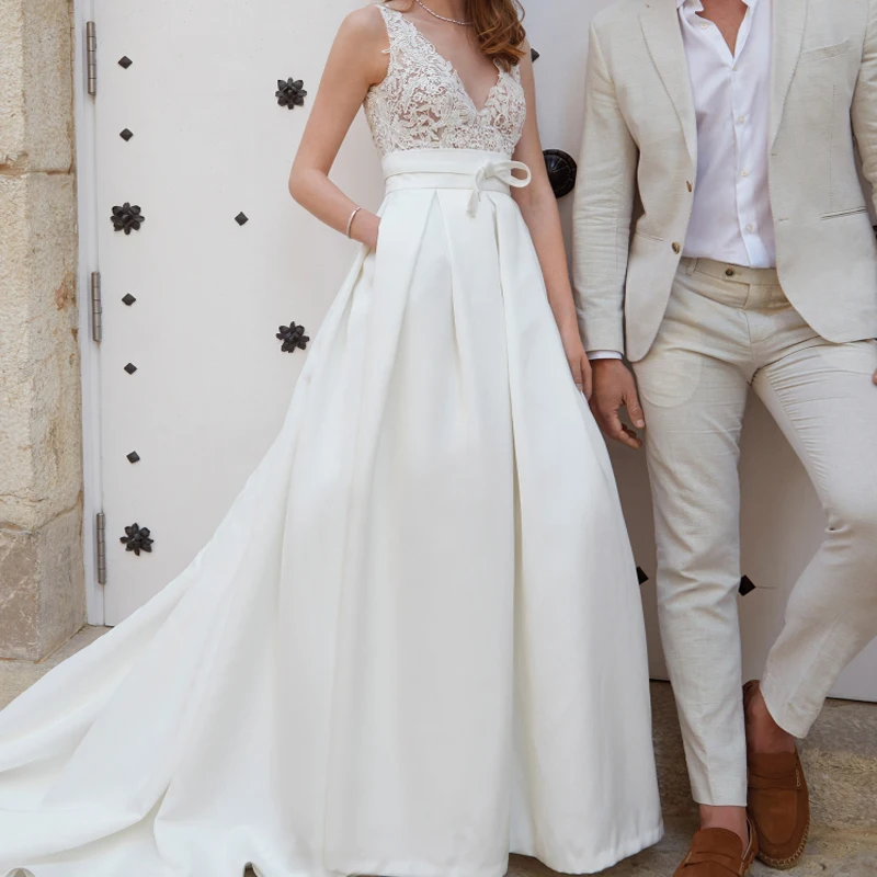 

Очаровательные кружевные свадебные платья а-силуэта без рукавов с V-образным вырезом