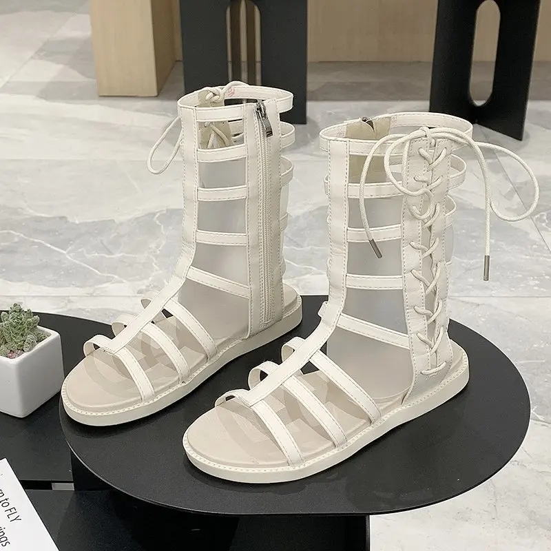 

Rivet sandals female summer new hollow zipper flat Roman open-toed boots sandals Martin boots, X842