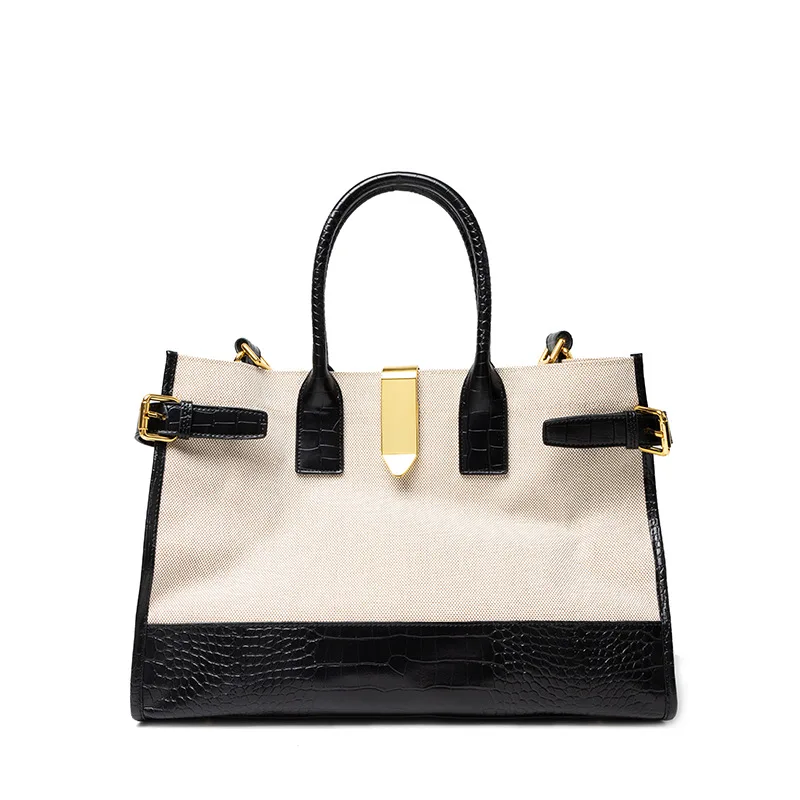 

Winter new female bag Niche design canvas hit color large capacity tote bag shoulder portable commuter big bag