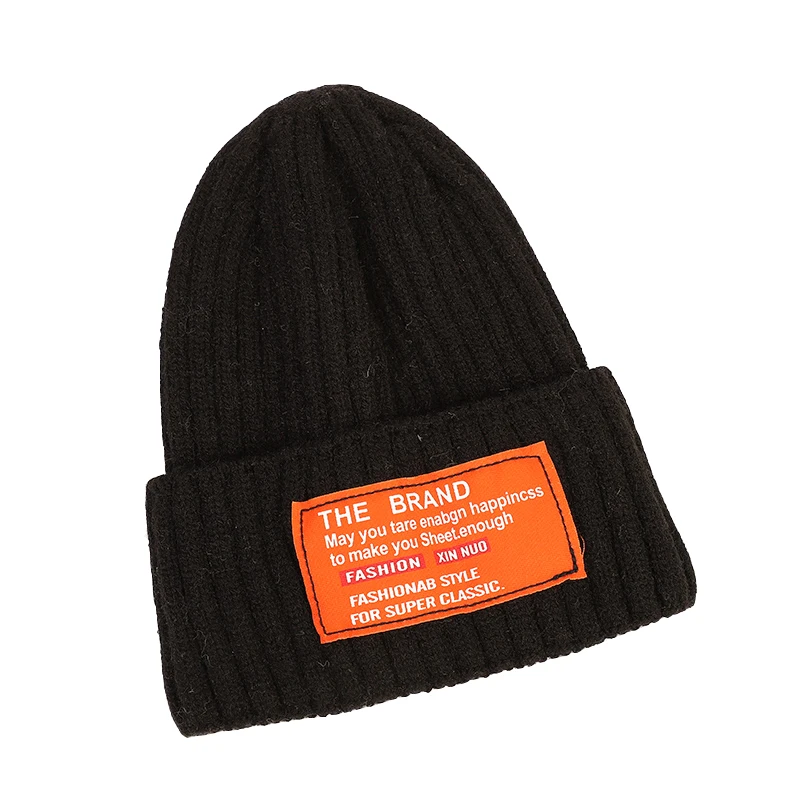 

New warm fluffy ball knit hat autumn and winter trend of women's adult hat with curled edge