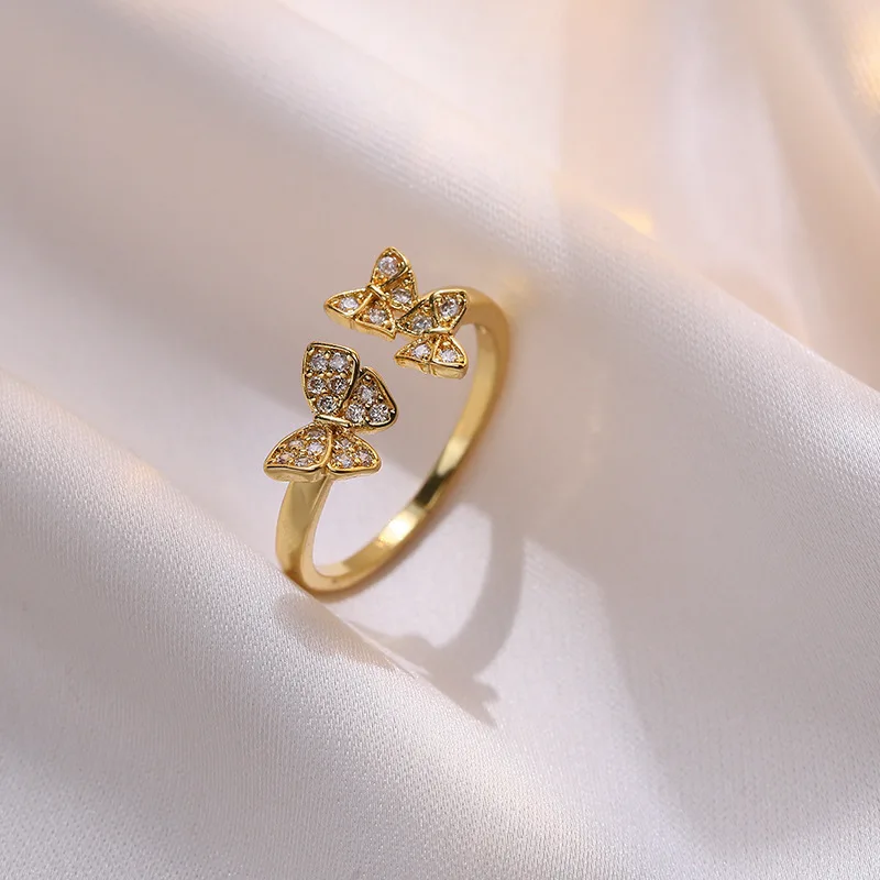 

Simple and fresh open butterfly ring three butterflies around the shape,fashionable and novel personality index finger tail ring