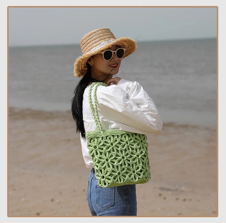 

Fashion hollow flower straw bag woven bag women's shoulder portable seaside vacation beach rattan bag 2021 new summer straw bag