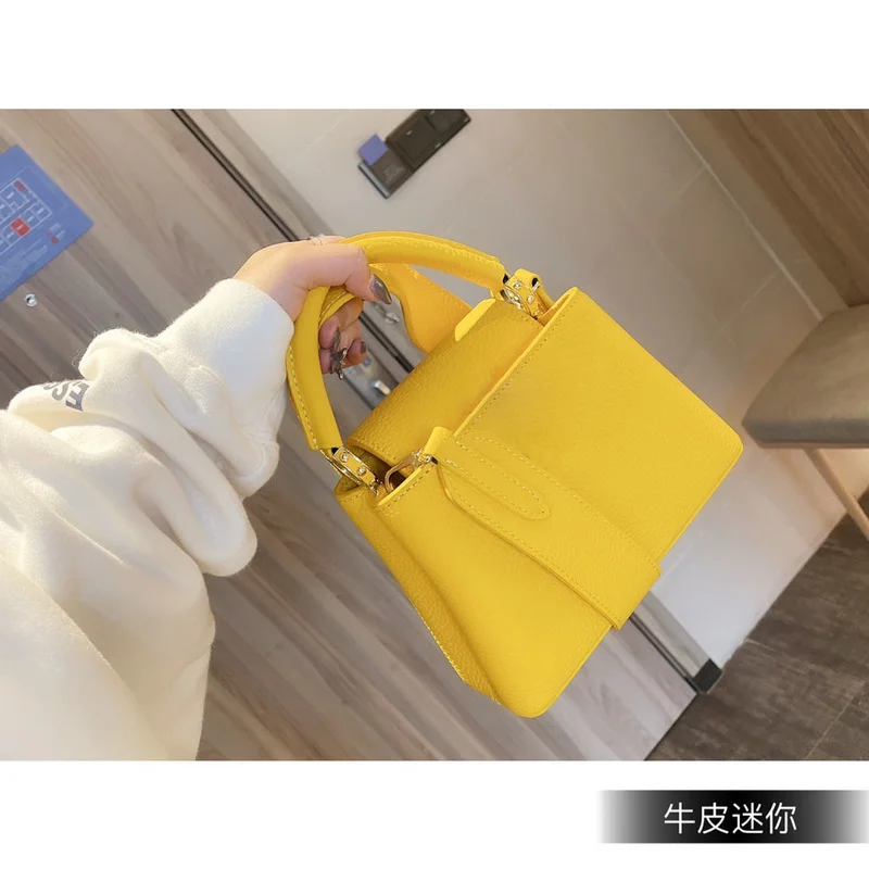 

100604 2021New lady's elegant and fashionable simple straddle shoulder bag