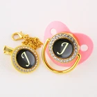 Соска-пустышка для младенца с буквами букв латинского алфавита