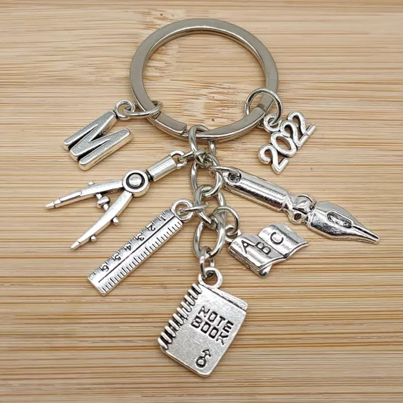 Новинка 2022 модная ручка с подвеской в виде надписи компас линейка брелок для