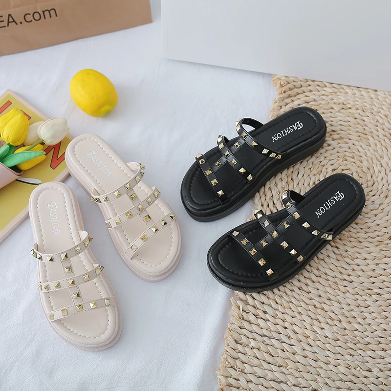 

Ladies sandals word with Roman sandals female summer flat bottom 2021 new rivet beach slippers