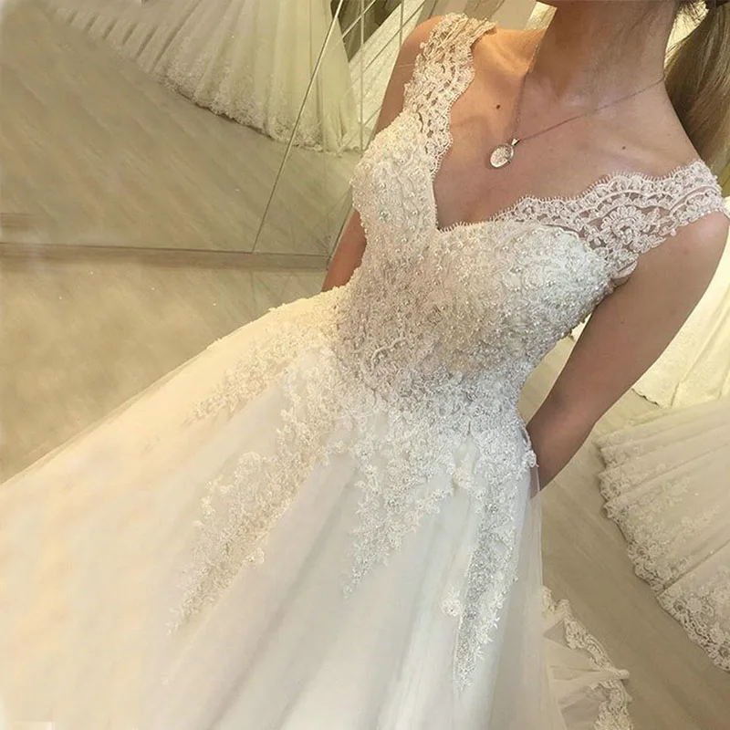 

Beaded V Neck Pearls Wedding Dress Custom Made 2021 Long Sleeveless Princess Bridal Gown