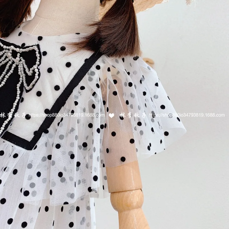 

Children's clothing 2021 summer new girl dress fashion flying sleeves mesh stitching girl polka dot dress