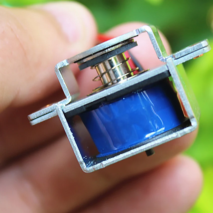 Миниатюрный электромагнит вдыхаемый через вытяжной микроэлектромагнит