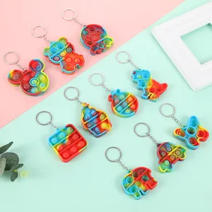 push pops its mini keychain dinosaur simple dimple fidget toy for
autism adhd anxiety anti stress relief edc sensory bubble