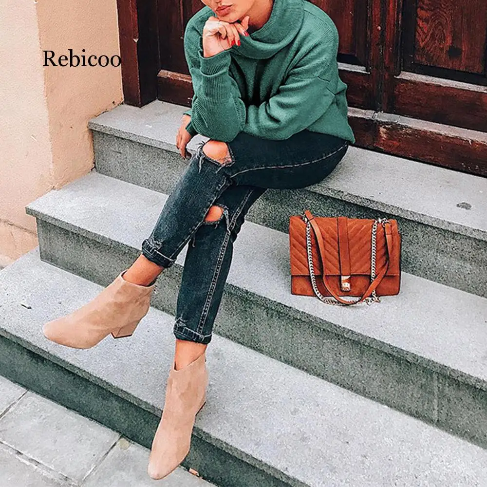 

2019 new fashion women's solid color casual wild high collar sweater loose knit top