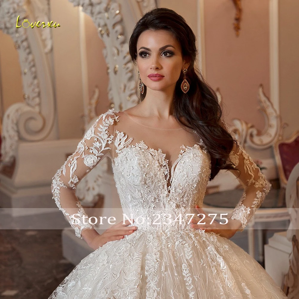 

Loverxu Sexy Illusion Long Sleeve Lace Princess Wedding Dresses 2019 Luxury Appliques Button Chapel Train Vintage Bridal Gowns