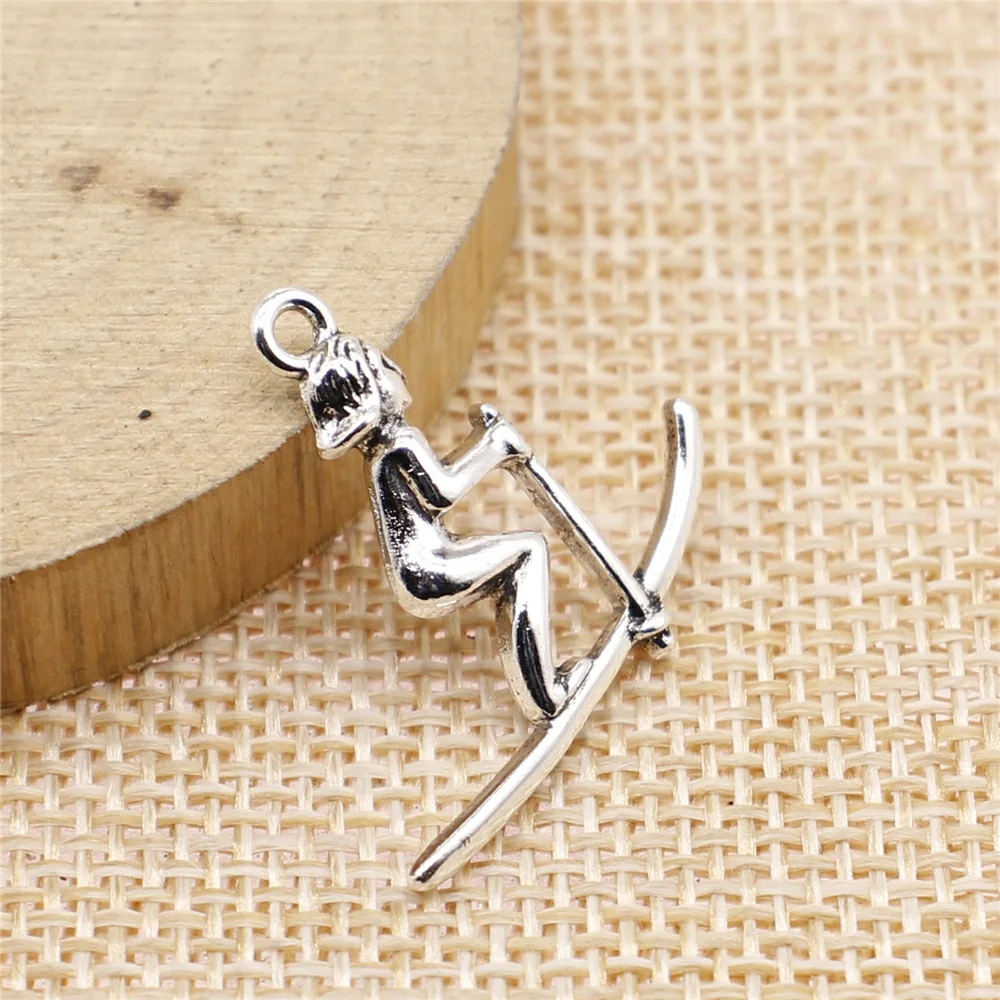 

free shipping 50pcs 24x26mm antique silver Ski girl charms diy retro jewelry fit Earring keychain hair card pendant accessories