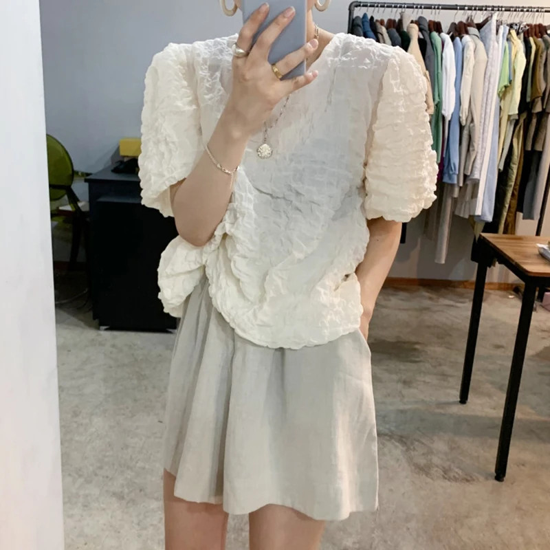 

Модная дизайнерская Корейская шикарная летняя простая свободная футболка из пузырчатой хлопковой ткани с круглым вырезом и длинными рукав...