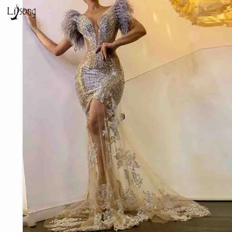 Женское вечернее платье русалка длинное блестящее с перьями и блестками