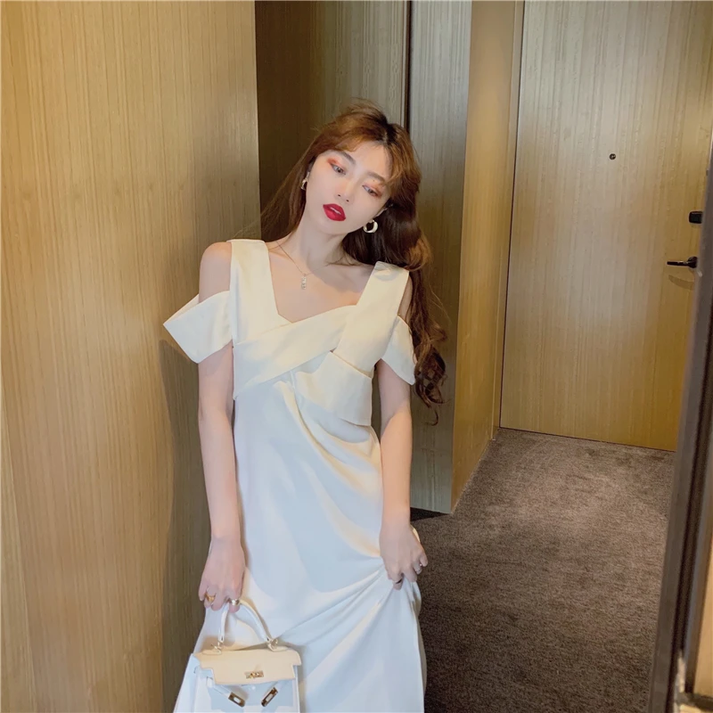 

Make French ins design feeling dew shoulder strap skirt temperament split personality fashion dress
