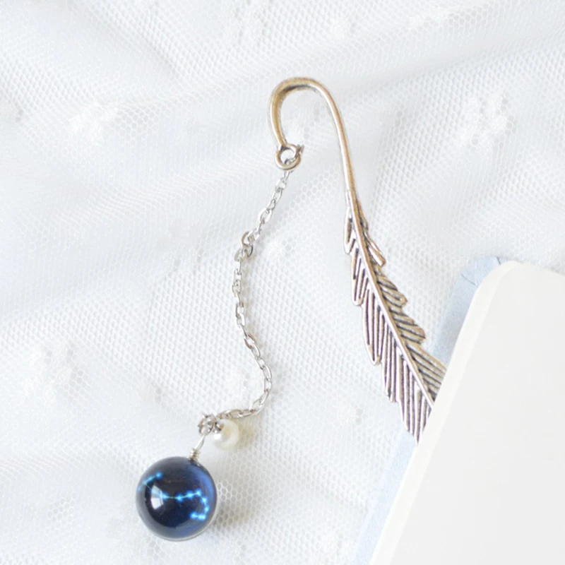 

Metal Feather Bookmark 12 Constellation Handmade Fluorescent Pendants Perfect Gift for Book Lover Reader DQ-Drop