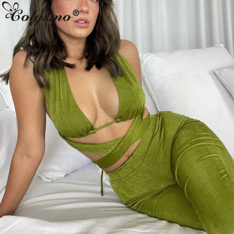 

Женский трикотажный костюм Colysmo, узкий комплект из двух предметов, расклешенные брюки, укороченный топ на шнуровке, блестящая одежда