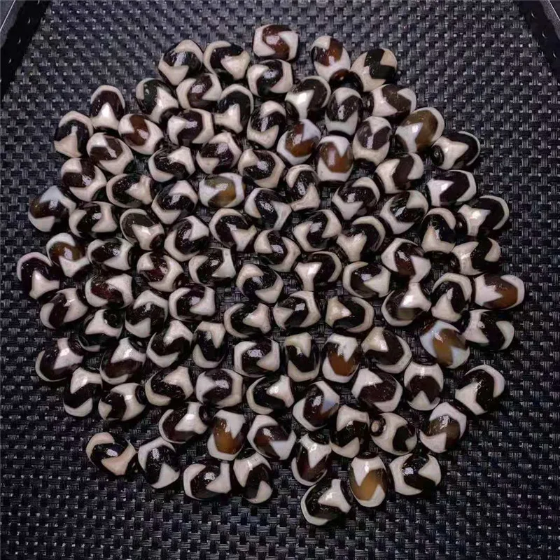 

Оптовая продажа, волшебные бусины Daluo из натурального агата 100 шт./лот, высокой жирности, тибетские бусины Dzi 15 мм * 20 мм вокруг изготовления юв...